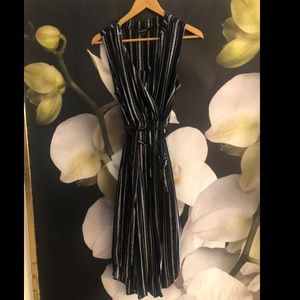 Barely worn. Le Chateau wrap style dress.